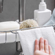 A sink caddy can keep sponges, soap dispensers, and other grimy things off your clean counters.